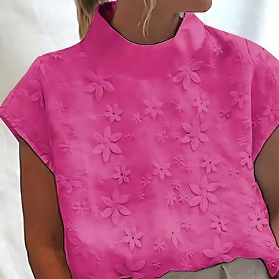 Doutzen | Blusa con cuello alto y bordado de flores