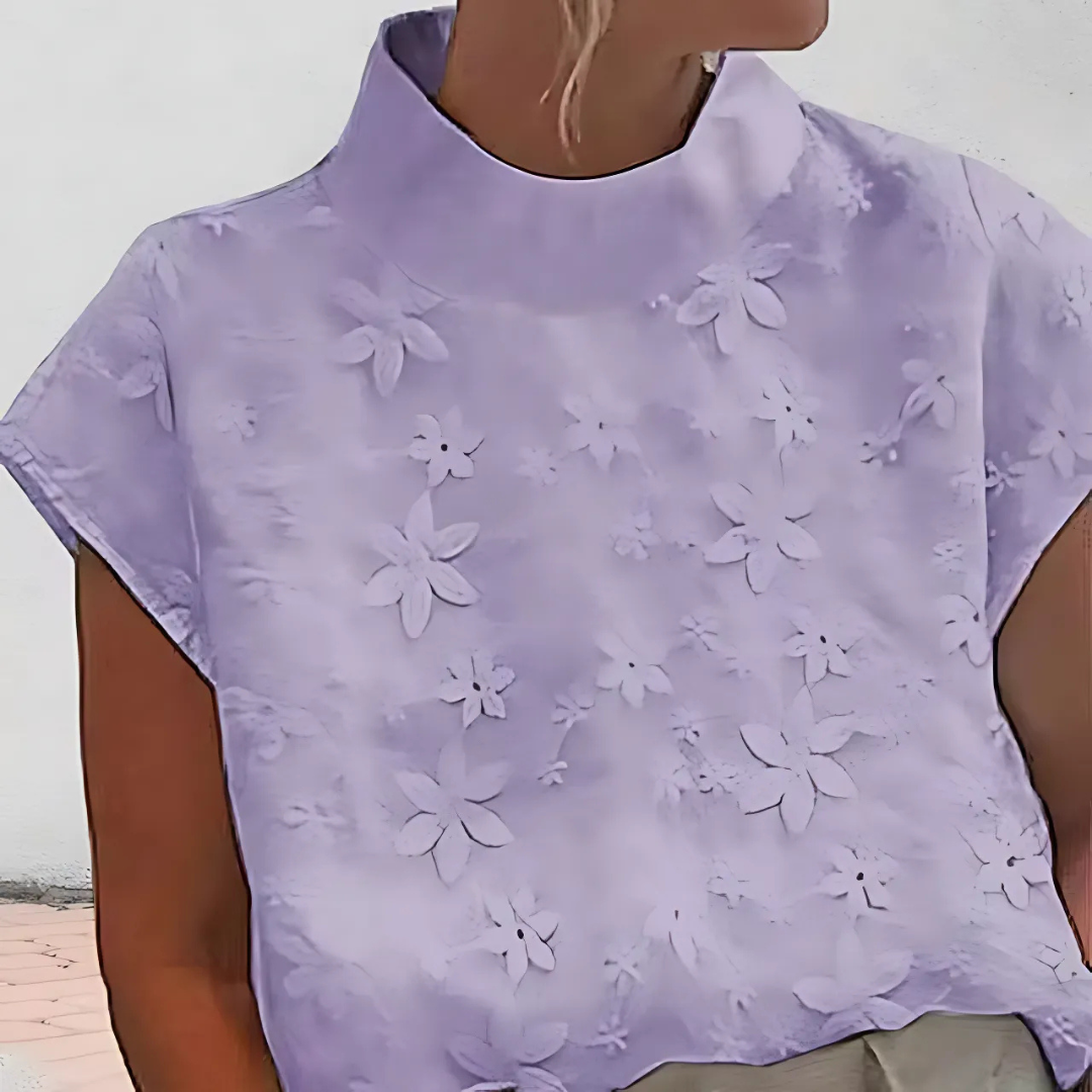 Doutzen | Blusa con cuello alto y bordado de flores