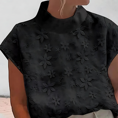 Doutzen | Blusa con cuello alto y bordado de flores