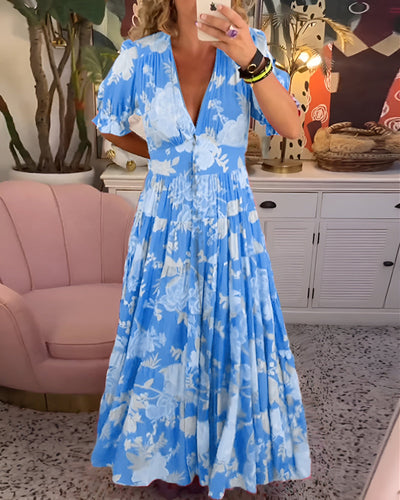 Carine | Vestido con cuello en V y bolsillos con estampado floral