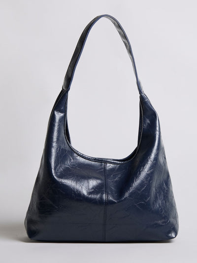 Bolso de mano Scarlett de piel desgastada