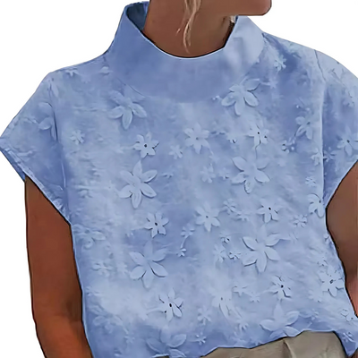 Doutzen | Blusa con cuello alto y bordado de flores