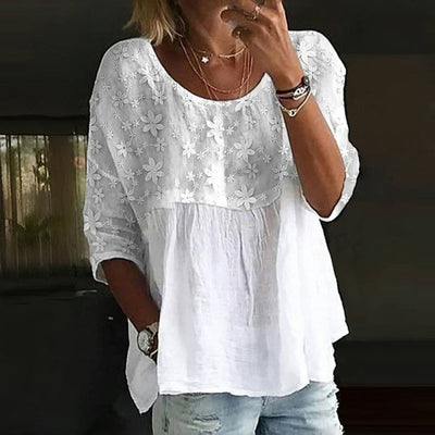 Blusa de patchwork con bordado floral