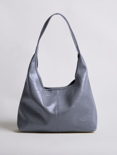 Bolso de mano Scarlett de piel desgastada