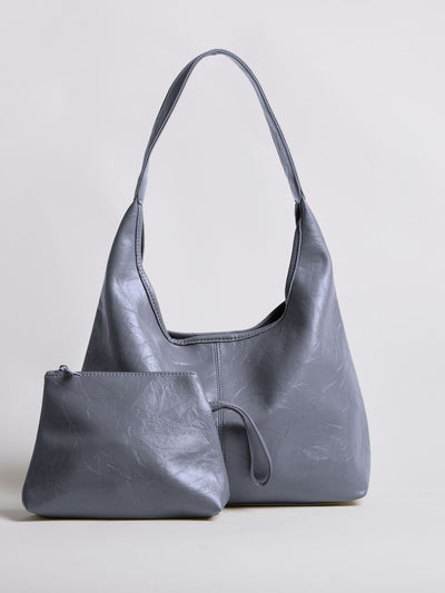 Bolso de mano Scarlett de piel desgastada